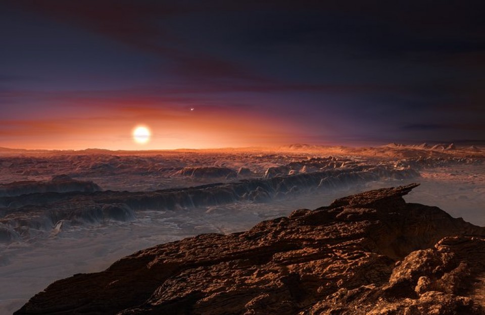 Aurkitu duten planeta berria. Atzean, 'Proxima Centauri' izarra. Ilustrazioa: ESO/M. Kornmesser