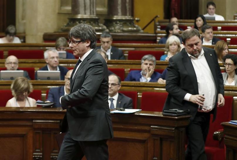 El presidente y vicepresidente de la Generalitat, Carles Puigdemont, y Oriol Junqueras. Foto: EFE