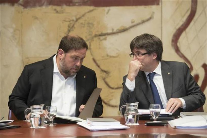 El vicepresidente de la Generalitat, Oriol Junqueras, junto al presidente Puigdemont. Foto: EFE
