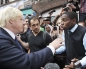London mayor heckled by crowd as he tours riot area
