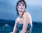 Milla Jovovich is the new face of the 2012 Campari calendar