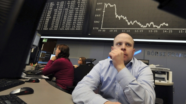 Operadores de bolsa pendientes de la evolución del mercado. Foto: EFE