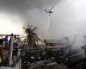 Airplane crashes into Philippine school, 13 killed