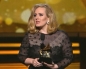 Adele triumphs at Grammy Awards with six wins
