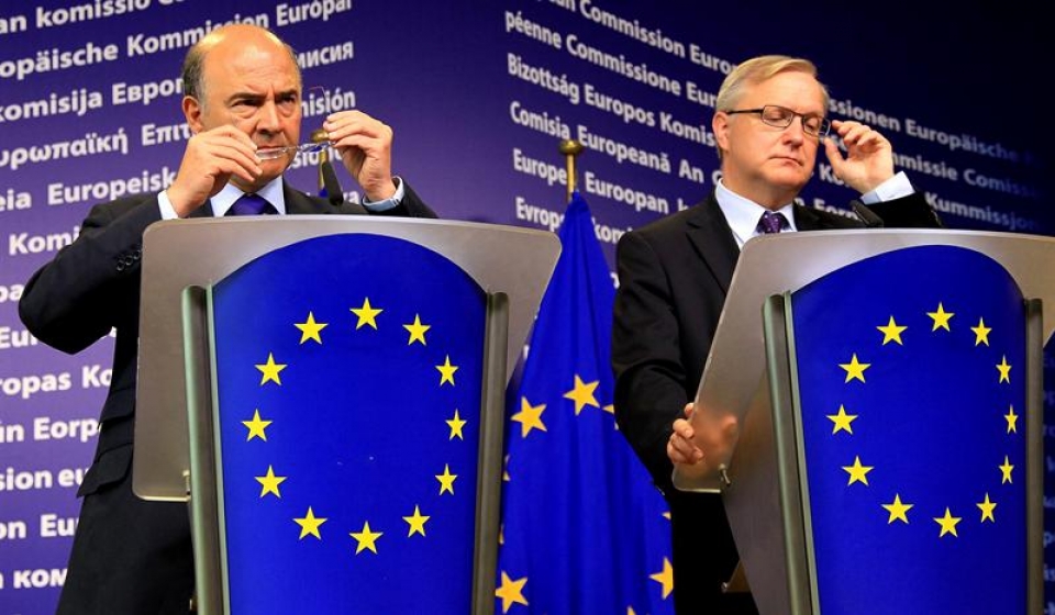 El ministro francés de Finanzas, Pierre Moscovici, y el comisario económico de la CE, Olli Rehn. EFE
