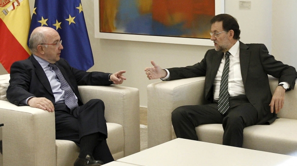 EU Competition Commissioner Joaquin Almunia and Spanish PM Mariano Rajoy. Photo: EFE