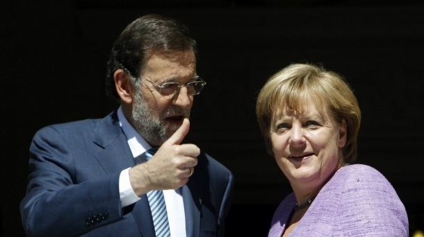 Merkel y Rajoy.