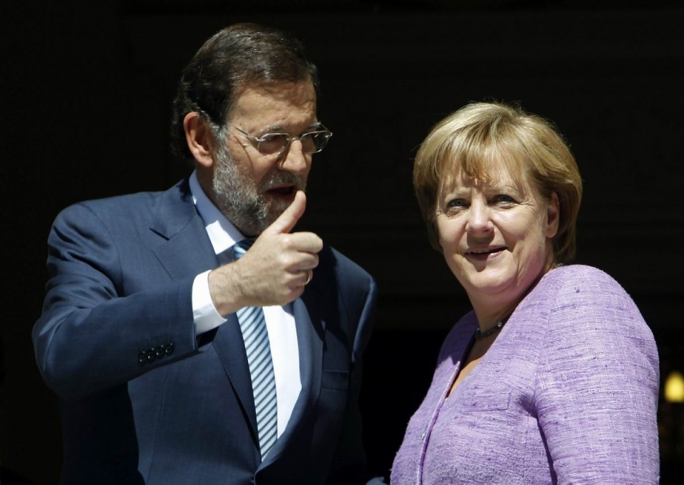 Merkel y Rajoy.