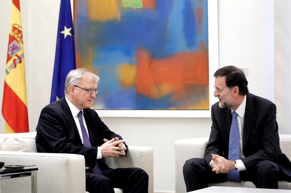 Rajoy con el vicepresidente económico de la Comisión Europea, Olli Rehn.