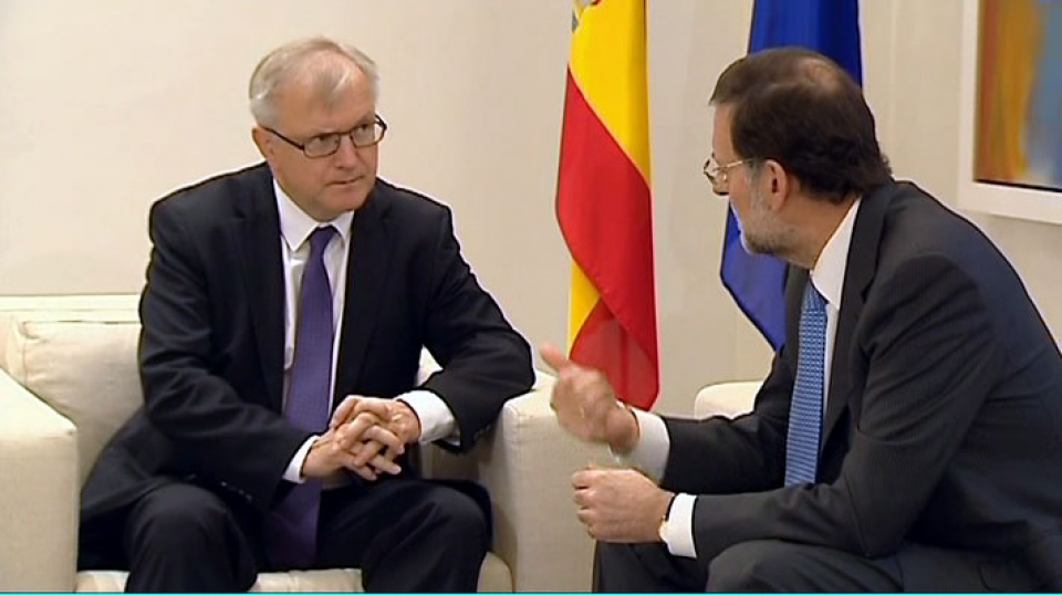 Rajoy con el vicepresidente económico de la Comisión Europea, Olli Rehn.