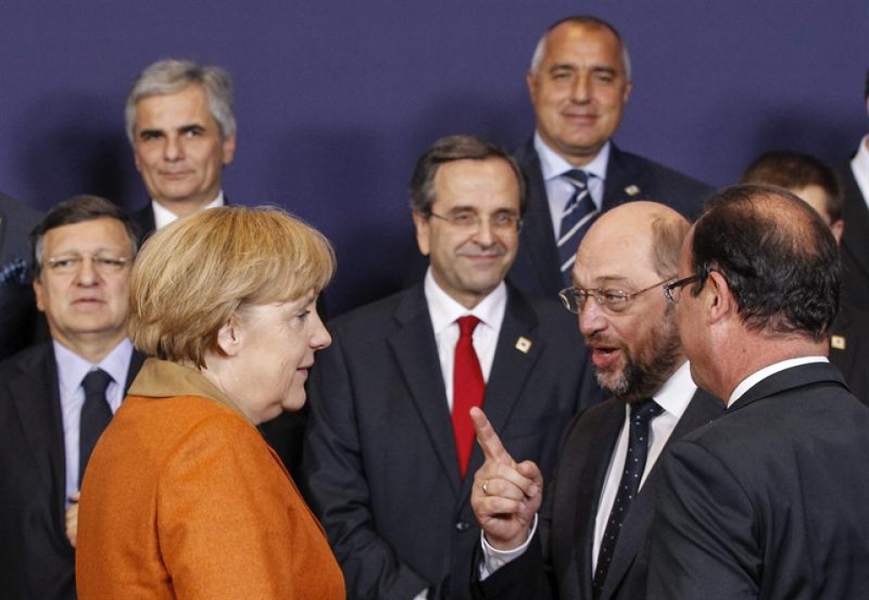 Merkel y Hollande, en la cumbre de Bruselas.