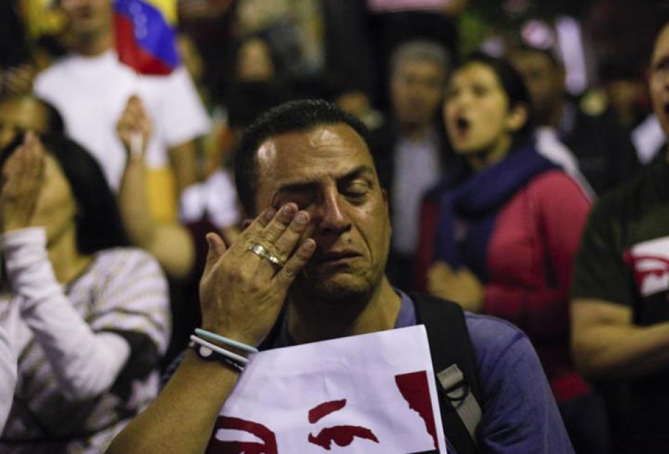 Seguidores de Hugo Chávez lloran su muerte en Caracas. EFE