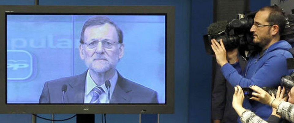 Mariano Rajoy declarando sobre la financiación del PP desde un plasma, en 2013. Foto: Efe