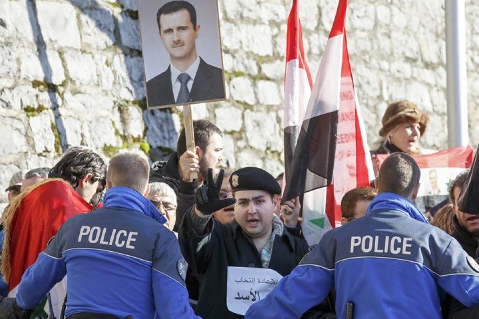 Partidarios de Al Asad se manifiestan en Ginebra. Efe.