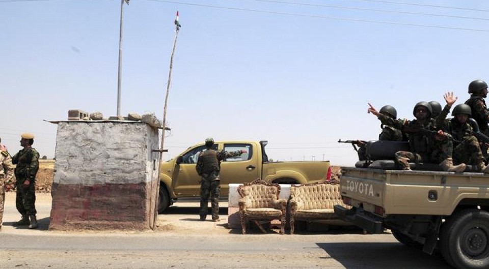 Soldados en un puesto de control, cerca de Mosul. Efe.
