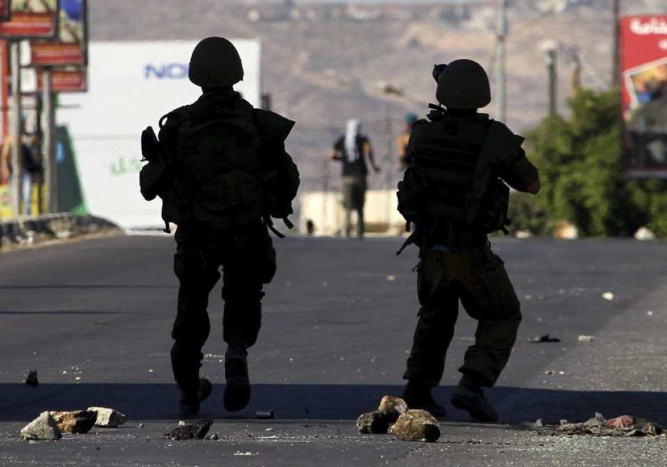 Soldados israelíes, en la incursión por tierra. Foto: EFE