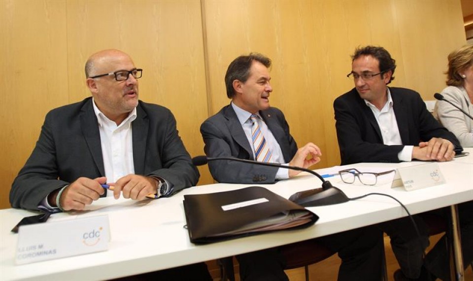 Lluís M. Corominas, Artur Mas y Josep Rull, en la reunión, hoy. Foto. EFE