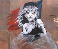 Errefuxiatuen egoera salatzeko graffitia egin du Banksyk Londresen