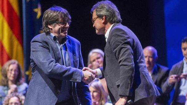 Carles Puigdemont y Artur Mas, en la conferencia de PDeCAT. Foto: EFE