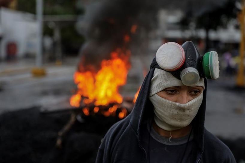Protestas ayer mismo, en Caracas. Foto: EFE