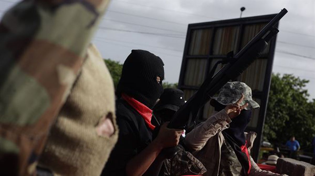 Personas armadas en la actividad conmemorativa al "repliegue táctico" de los sandinistas. EFE