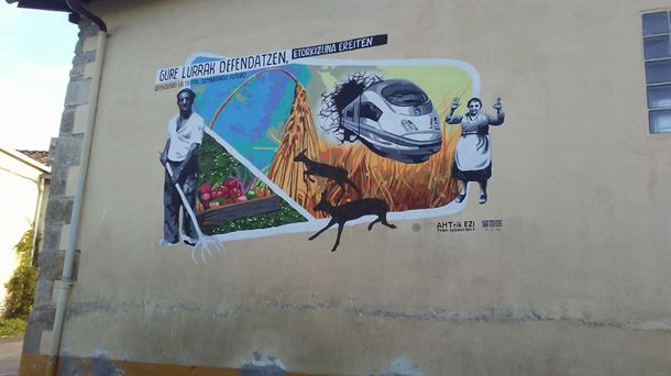 Imagen de un mural participativo pintado en la calle