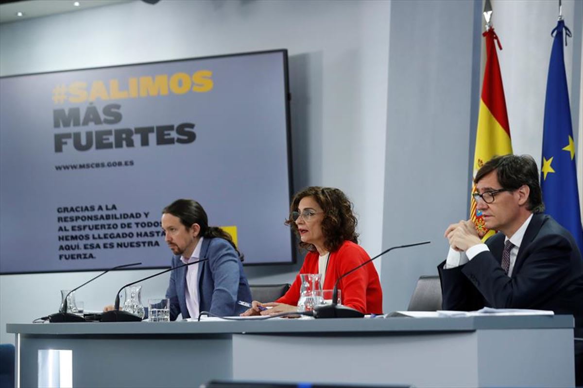 Pablo Iglesias, María Jesús Montero y Salvador Illa / EFE