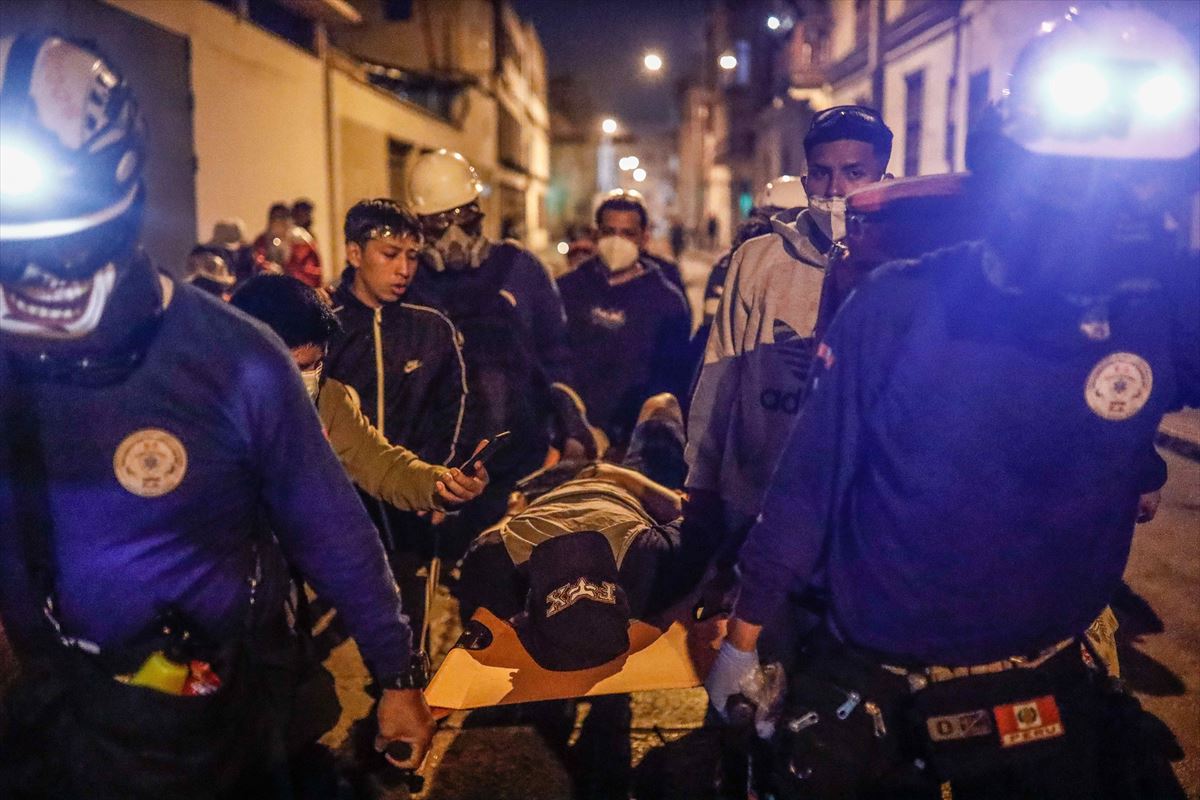 Manifestante herido. Foto: EFE.