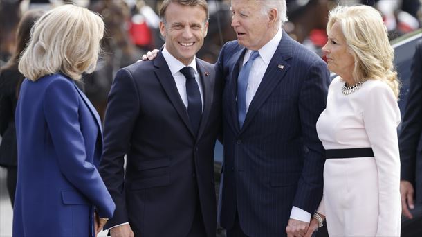 Macron y Biden con sus respectivas parejas. Foto: EFE