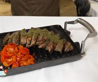 Presa ibérica a la parrilla en el restaurante La Olla de la Plaza Nueva en Bilbao